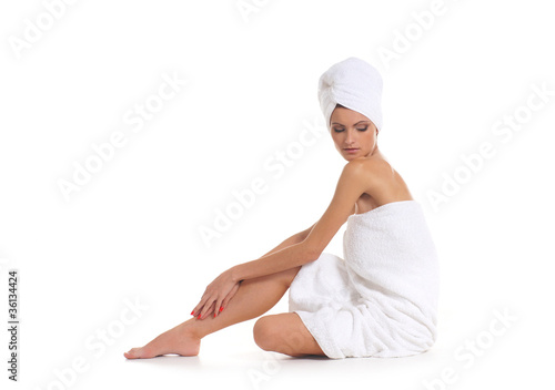 Young attractive woman getting spa treatment isolated on white