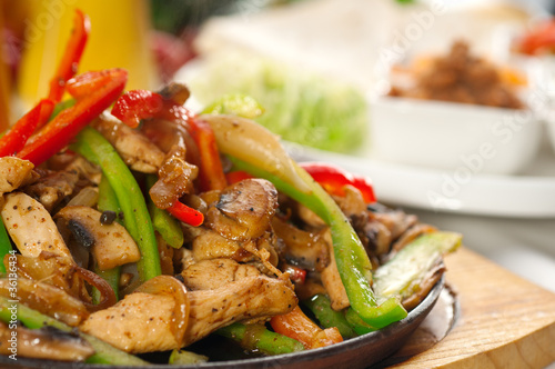 original fajita sizzling hot  on iron plate