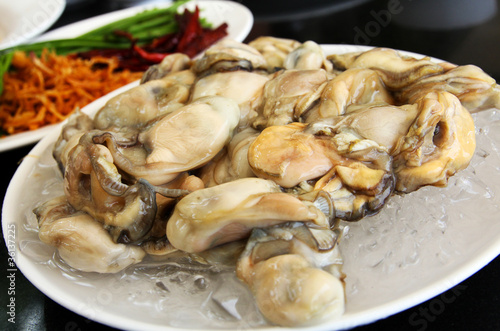 Fresh oysters on ice.