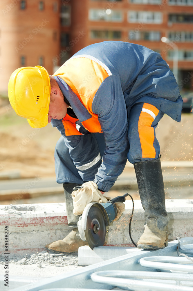 builder working with cutting grinder builder working with cutting grinder