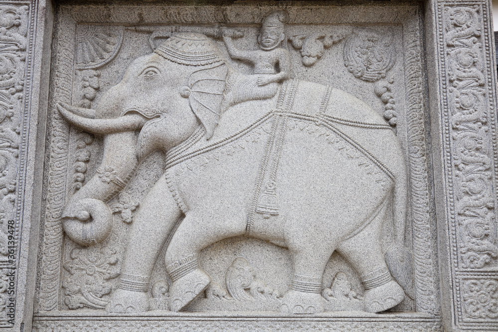 stone carving of elephant in buddhist temple, sri lanka