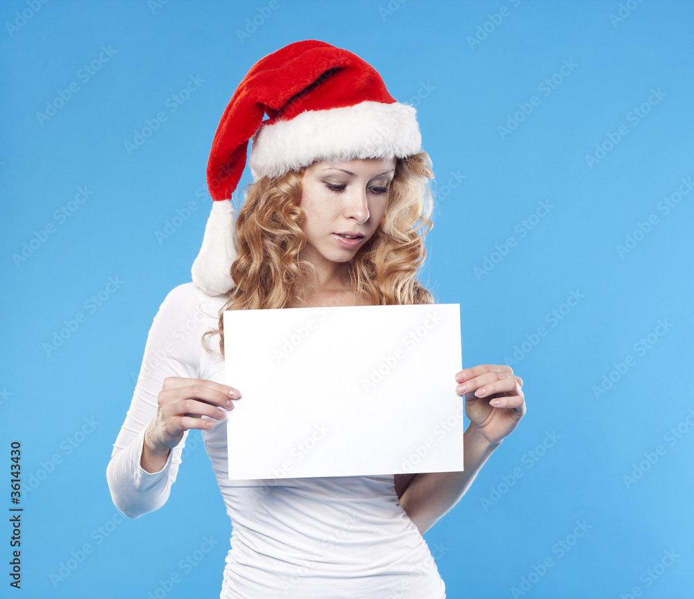 Pretty Santa girl with a blank Pretty Santa girl with a blank