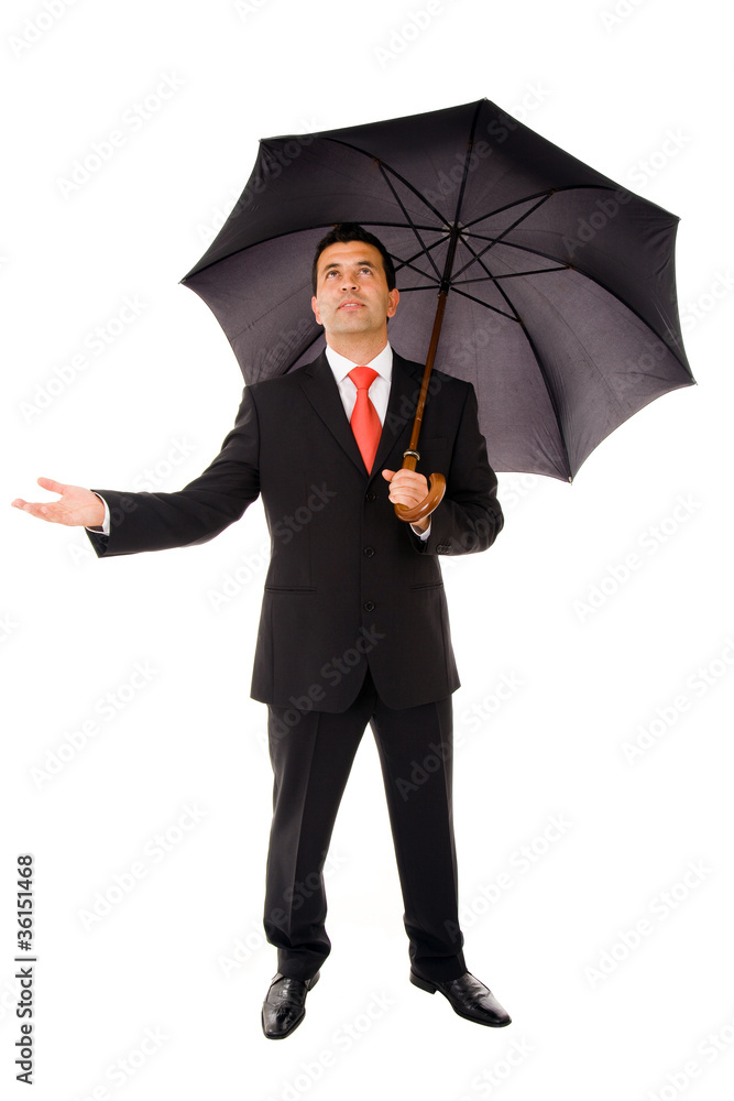 Full body of young business man with umbrella and checking the r Full body of young business man with umbrella and checking the r