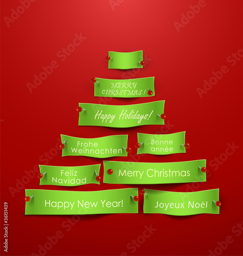Paper cuts in the shape of Christmas tree.