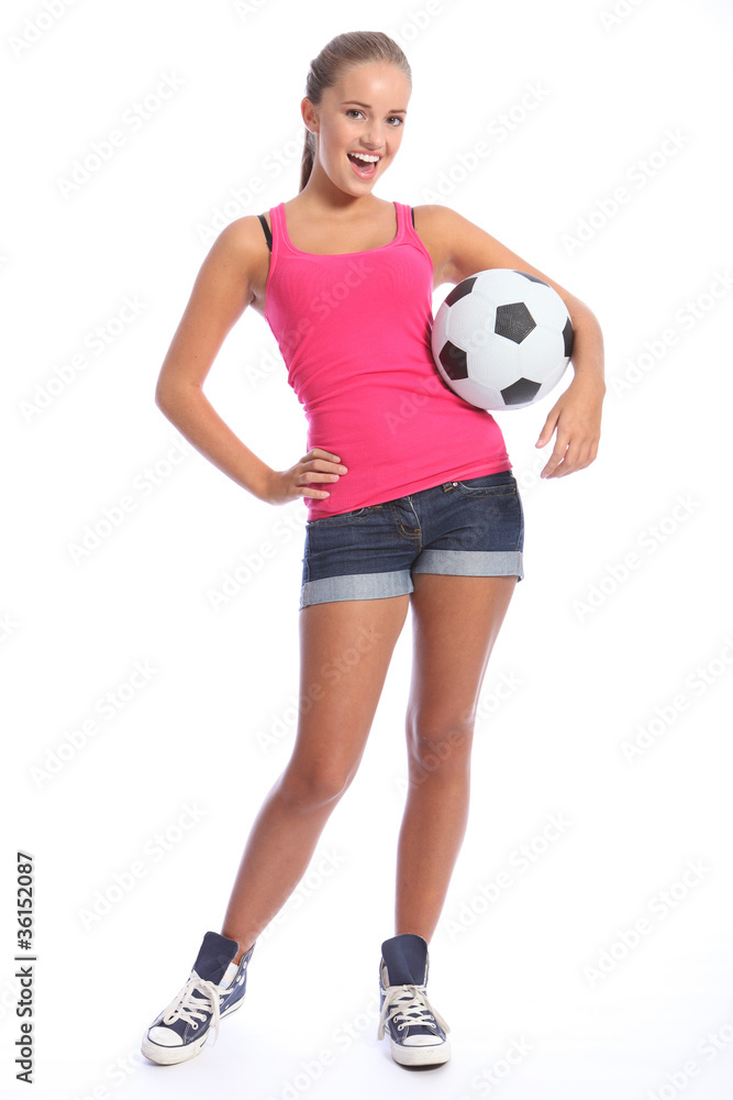 Beautiful soccer player teenage girl with ball