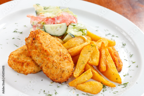 chicken cutlet with fried potatoes