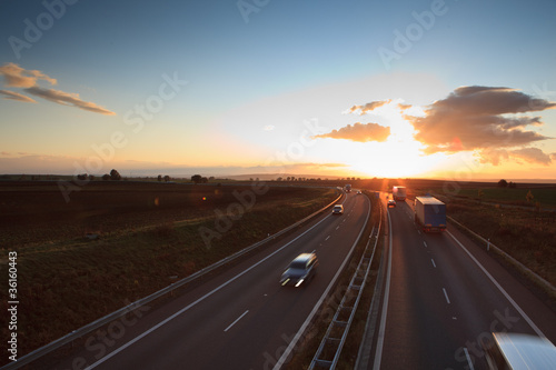 highway traffic - motion blurred truck on a highway © lightpoet