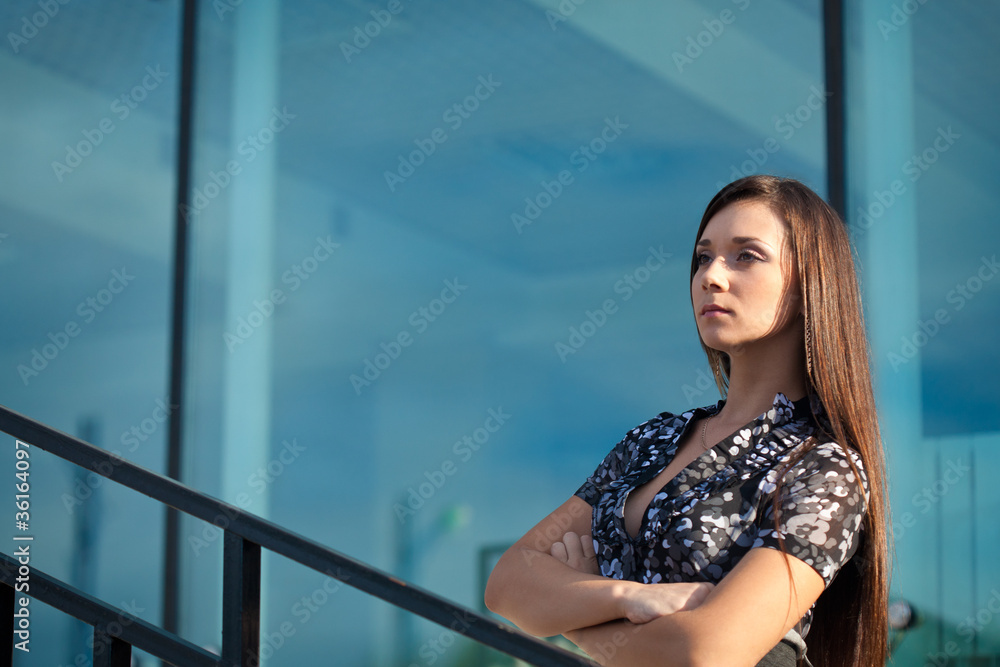 seriously woman standing on stairway, horizontal seriously woman standing on stairway, horizontal