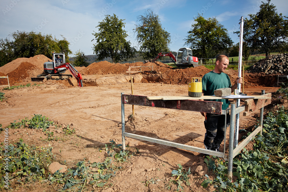 start of building a house, earth moving start of building a house, earth moving
