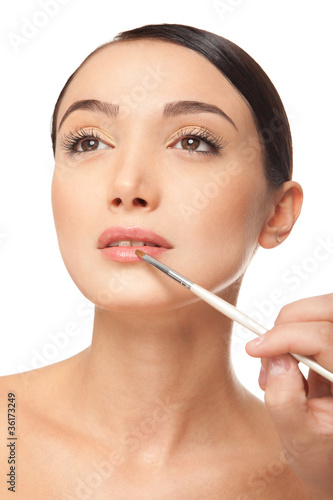 Beauty woman face with brush