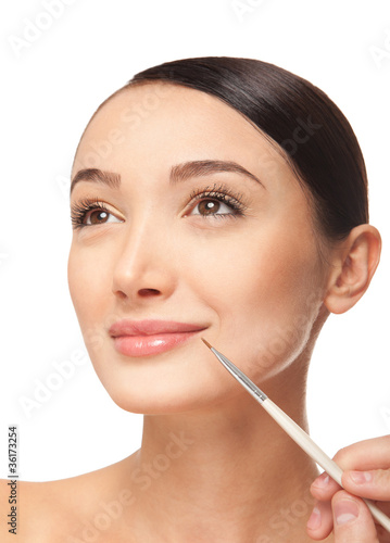Beauty woman face with brush