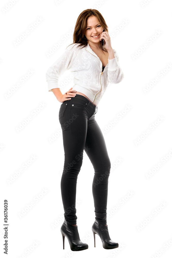 Smiling playful woman talking on the phone Smiling playful woman talking on the phone