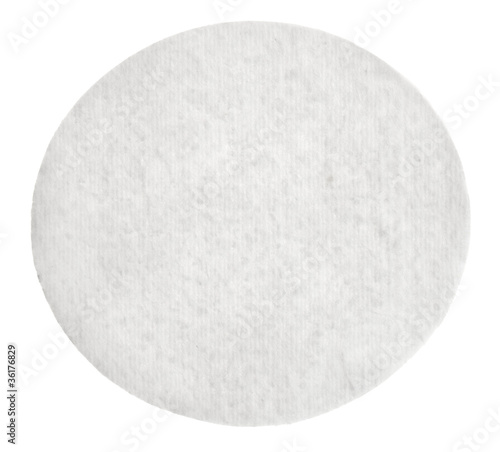 One round cotton cosmetic pad  isolated on white
