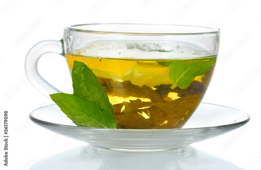green tea in transparent cup and mint isolated on white