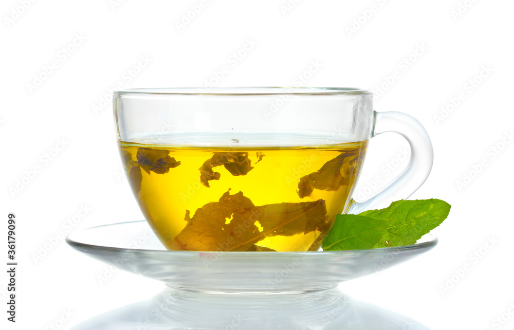 green tea in transparent cup and mint isolated on white green tea in transparent cup and mint isolated on white