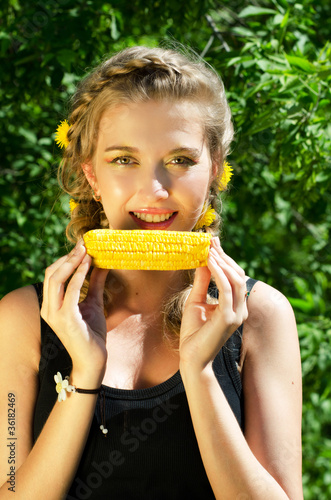woman eating corn-cob