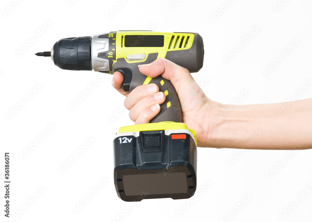 battery screwdriver in hand