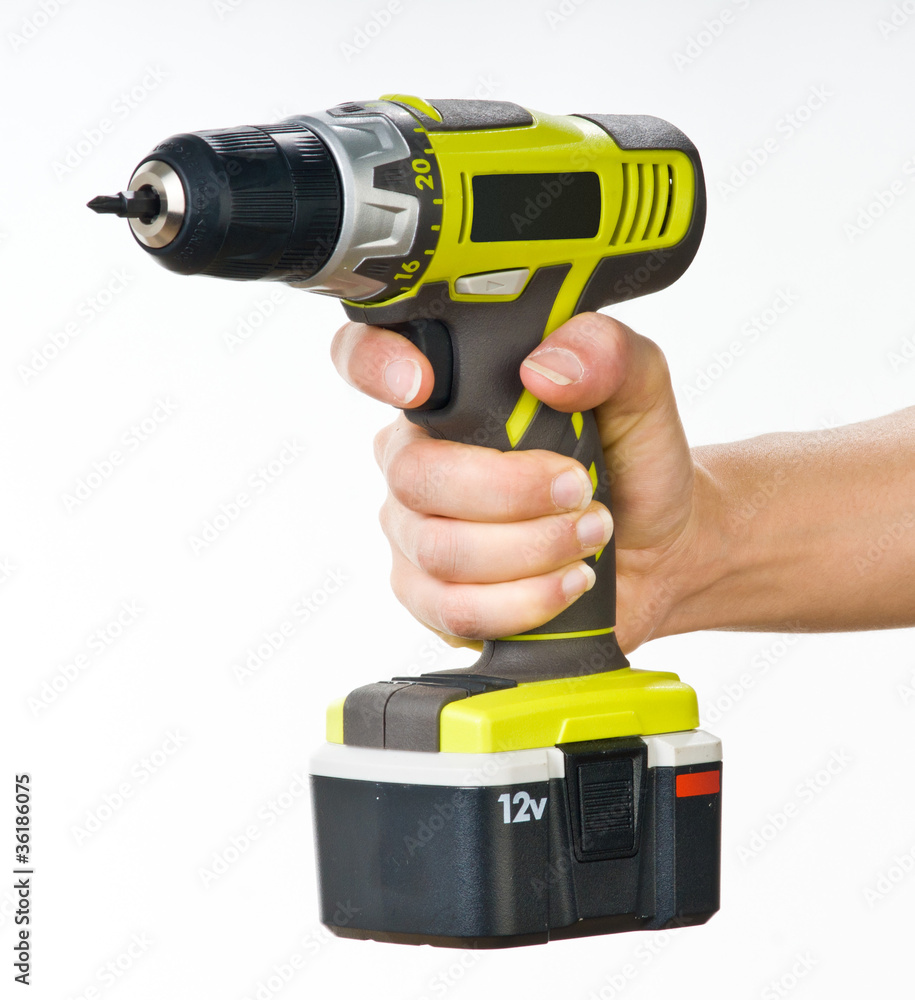 battery screwdriver in hand