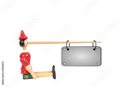 Wooden Pinocchio doll with long nose and name plate