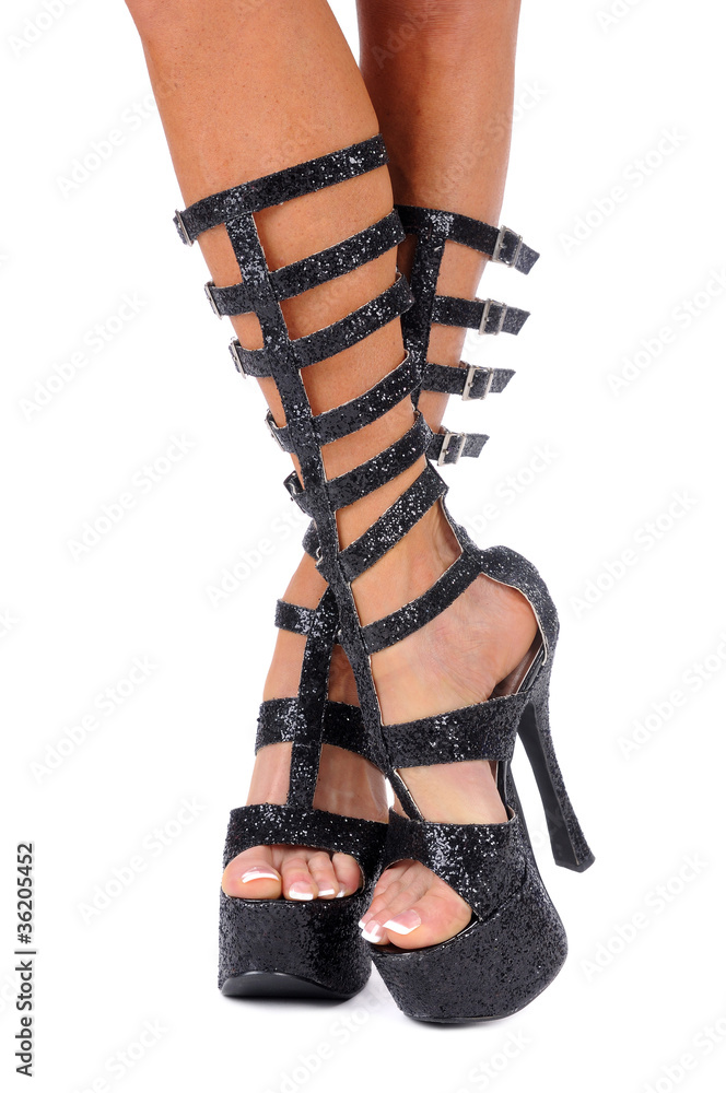 Crossed legs in black high heels Stock Photo | Adobe Stock