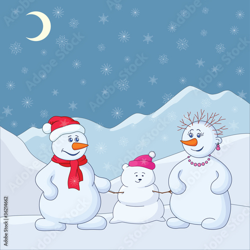 Snowmens in the winter mountains