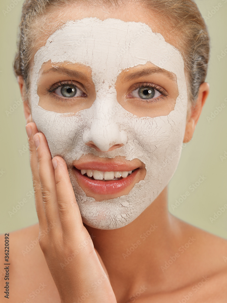 closeup beauty portrait woman with facial mask closeup beauty portrait woman with facial mask