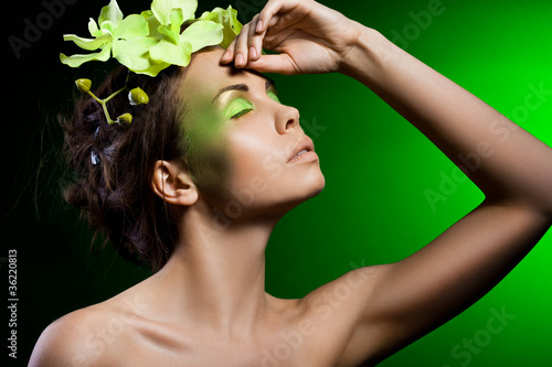 elegant fashionable woman with orchid