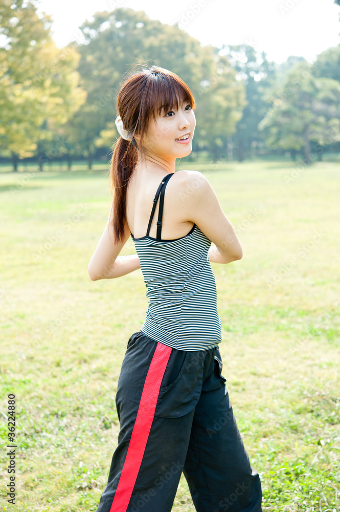 beautiful asian woman exercising in the park beautiful asian woman exercising in the park