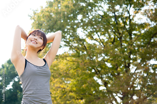beautiful asian woman exercising in the park