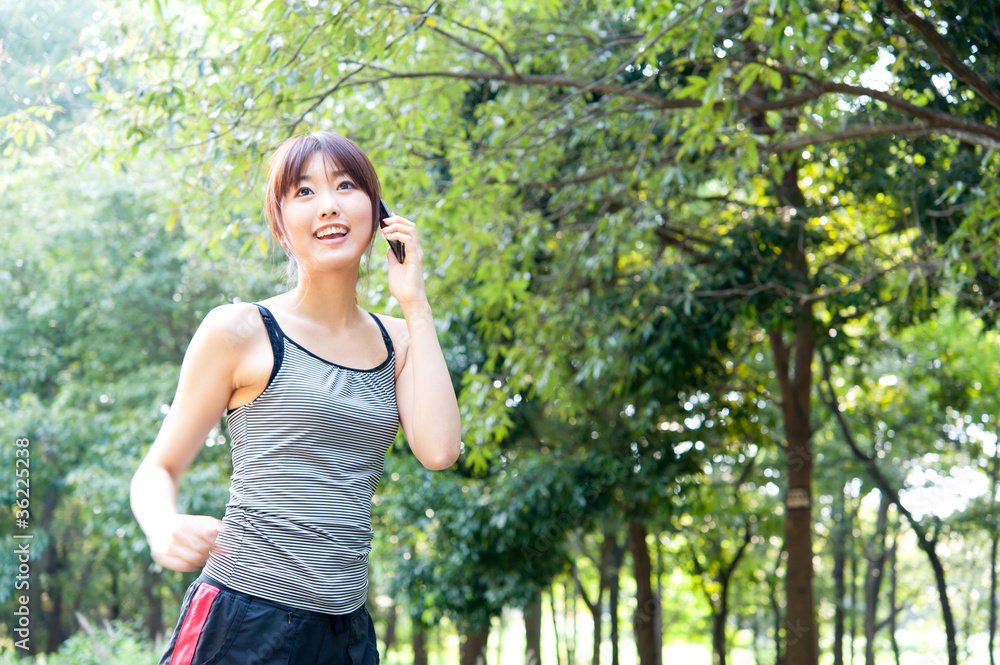 beautiful asian woman running in the park beautiful asian woman running in the park