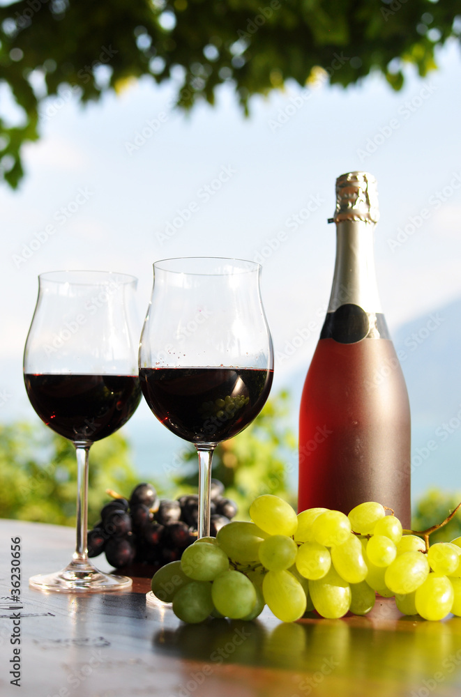 Red wine and grapes