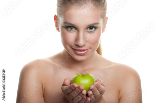 Young happy smiling woman with apple