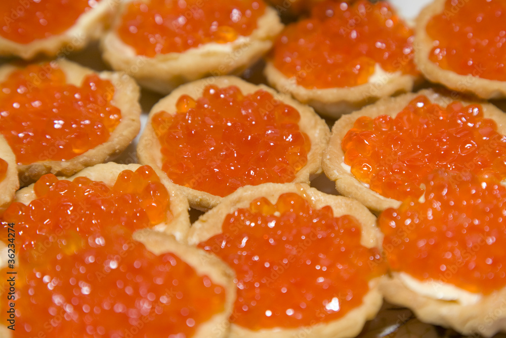 Tartlets with red caviar