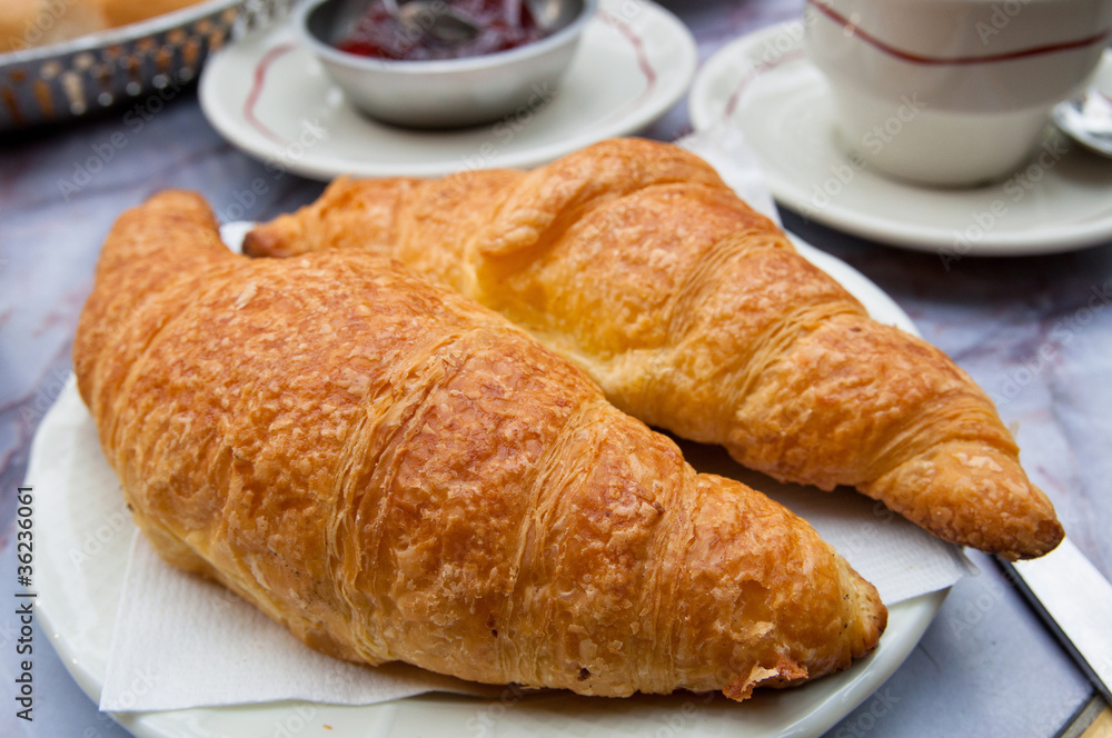 Breakfast with coffee and croissants Breakfast with coffee and croissants