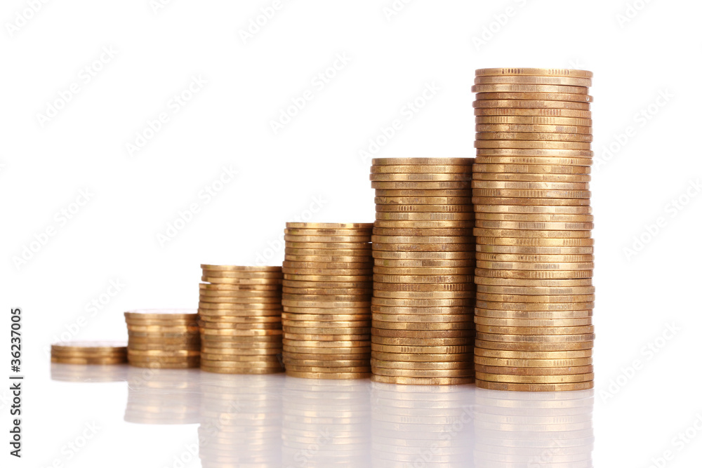 Many coins in column isolated on white Many coins in column isolated on white
