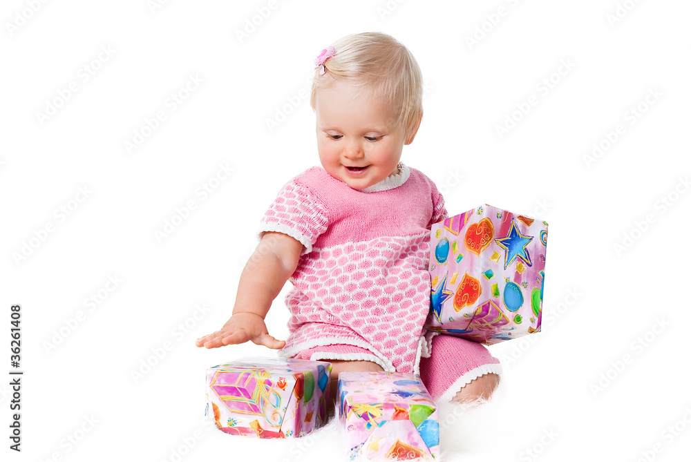 happy infant girl sitting with gift boxes isolated on white happy infant girl sitting with gift boxes isolated on white