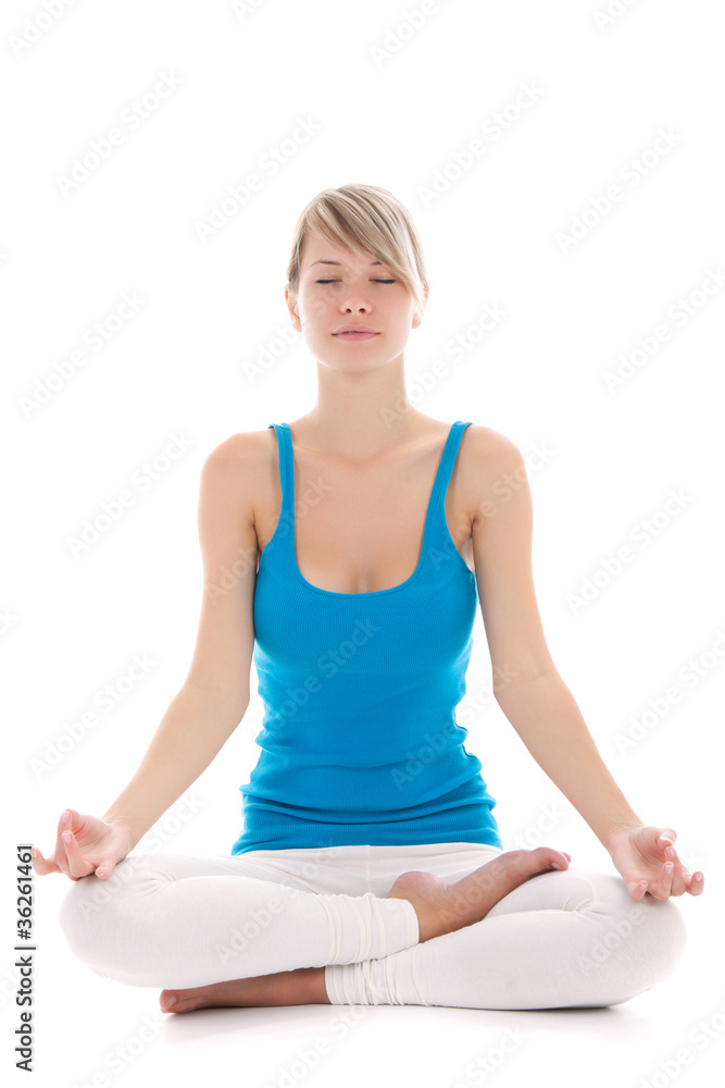 Portrait of a young healthy woman doing yoga exercises