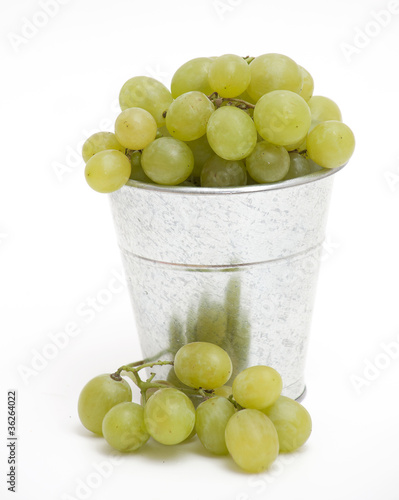 bucket with green grapes