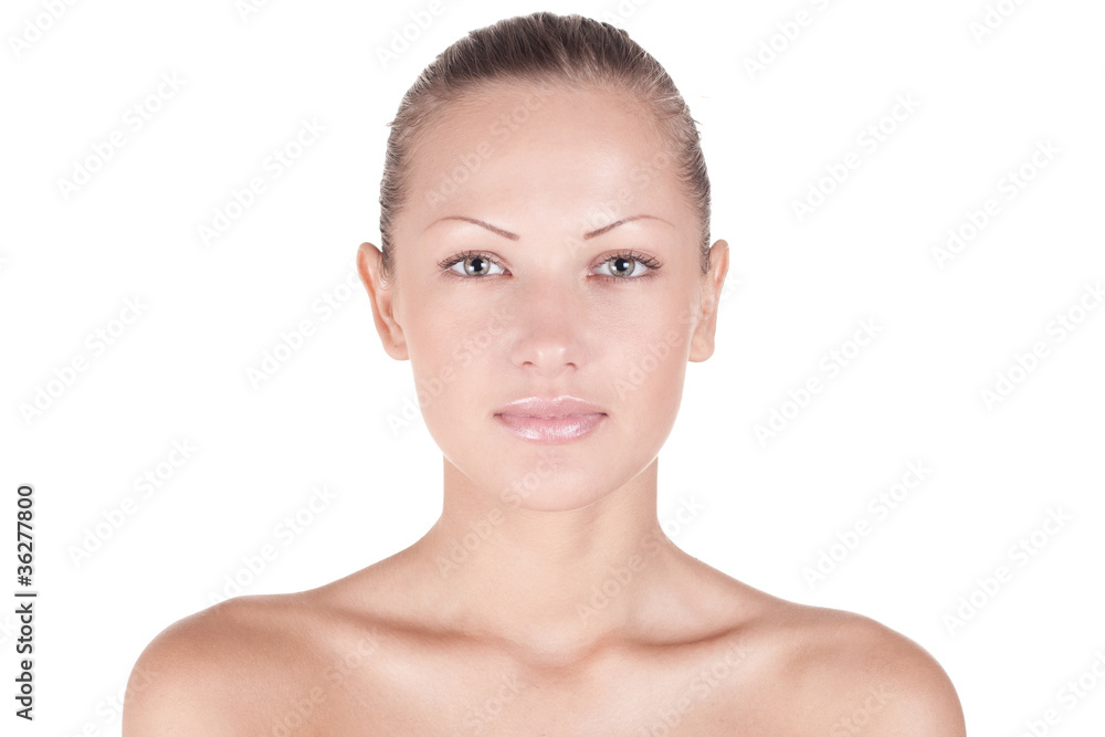 Beautiful woman's face with clean skin - isolated on white Beautiful woman's face with clean skin - isolated on white