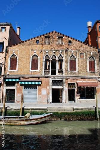 Old house facade on Murano island, Venice, Italy