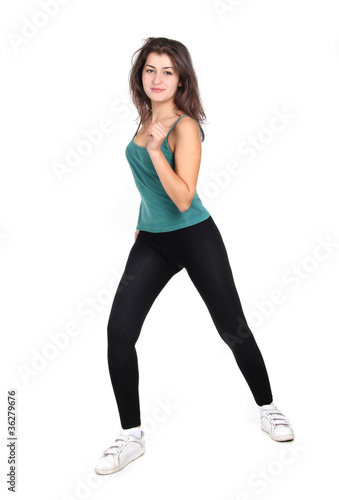 young attractive woman doing fitness isolated over white