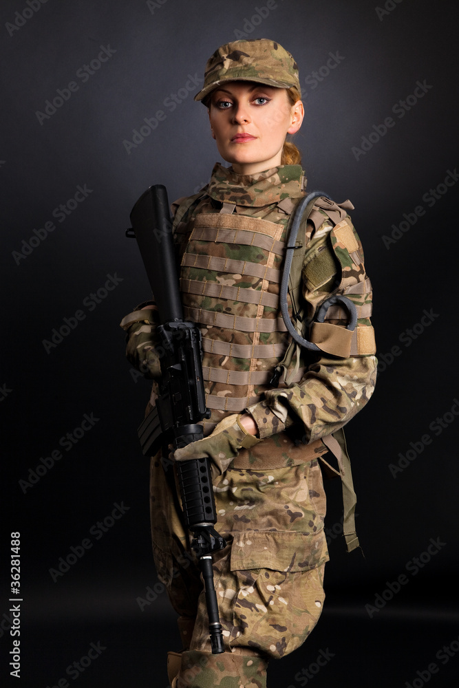 Beautiful army girl with rifle Beautiful army girl with rifle