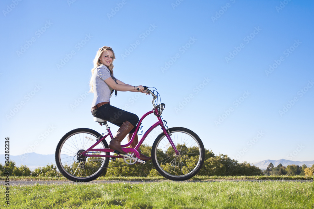 Beautiful Young Woman on a bike ride