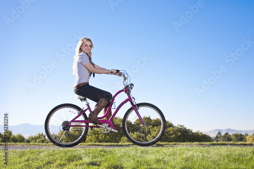 Beautiful Young Woman on a bike ride