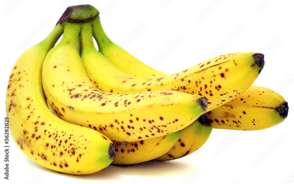 Fotografie Bananas with Brown Spots Isolated on White Background