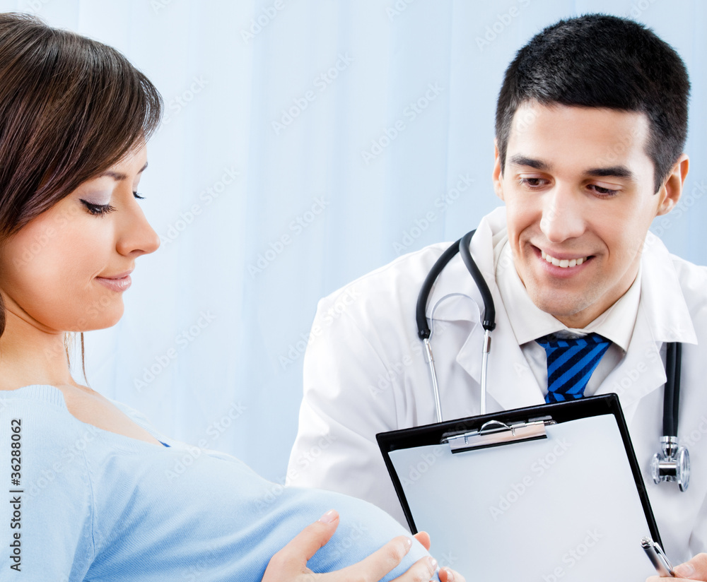Doctor and pregnant woman with prescription Doctor and pregnant woman with prescription
