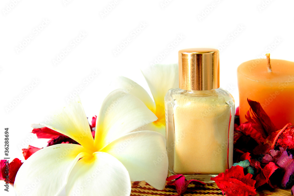 Spa products with flowers and candles Spa products with flowers and candles