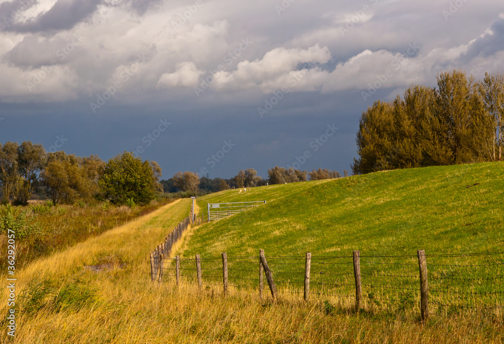 Threatening clouds in a Dutch autumn landscape