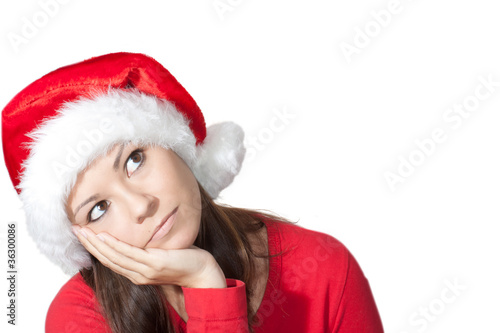Portrait einer gelangweilten jungen Frau im Weihnachtskost  m