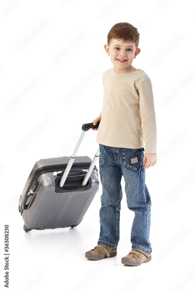 Little boy with suitcase smiling Little boy with suitcase smiling